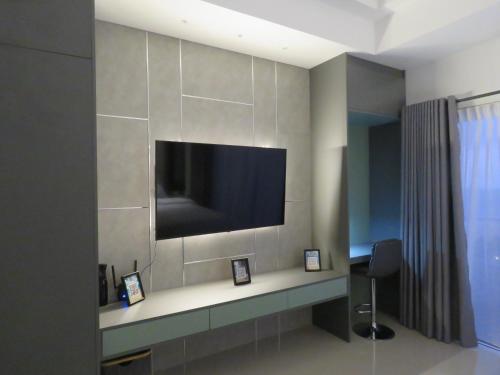 COASTAL COCOON STUDIOにあるテレビまたはエンターテインメントセンター