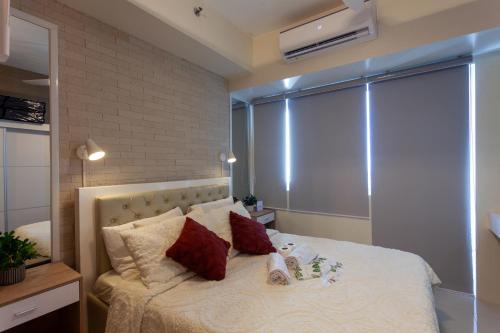 Postel nebo postele na pokoji v ubytování Room 2222 - Tagaytay, PH