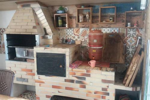 Küche/Küchenzeile in der Unterkunft Linda casa de praia 5km Beto Carrero - Gravatá. 300 metros da praia!!