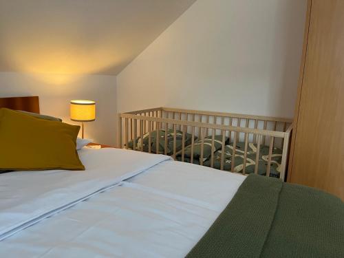 Ένα ή περισσότερα κρεβάτια σε δωμάτιο στο Chalet Harmony Rogla - apartment