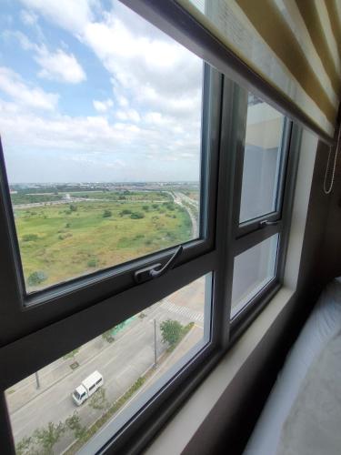 a view from a window of a highway at Refreshing Condo hotel in General Trias