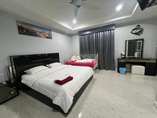 Lova arba lovos apgyvendinimo įstaigoje Pattaya pool villa by Penny