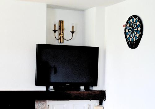 TV a/nebo společenská místnost v ubytování Casa de Travassos