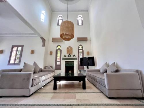 Posezení v ubytování Villa 1 by Majestic Properties