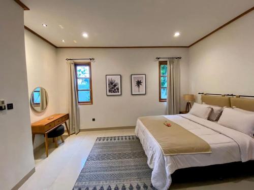 Katil atau katil-katil dalam bilik di H3 Pererenan -- location very close to the beach