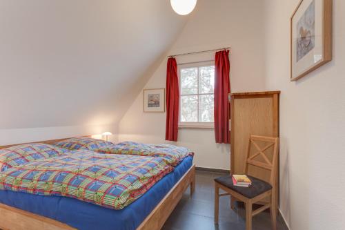 Postel nebo postele na pokoji v ubytování Ferienhaus Inga