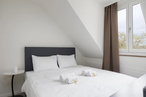 Postel nebo postele na pokoji v ubytování Superior Studio On Top Floor BE-51