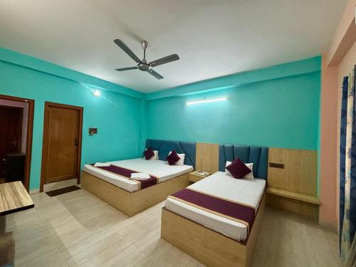 Krishna Shree Guest Houseにあるベッド