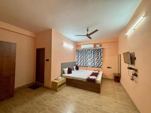 Krishna Shree Guest Houseにあるベッド
