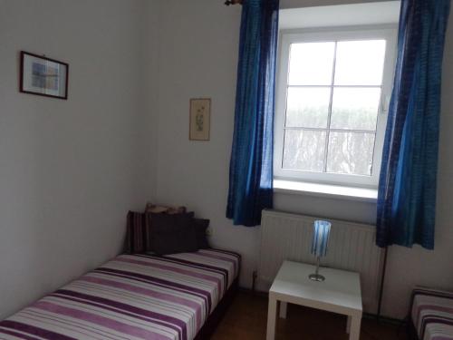 A bed or beds in a room at Seevilla Annenheim