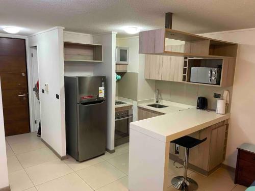 Kuchyň nebo kuchyňský kout v ubytování Cómo Nuevo Depto, Mejor Ubicación Ñuñoa!!