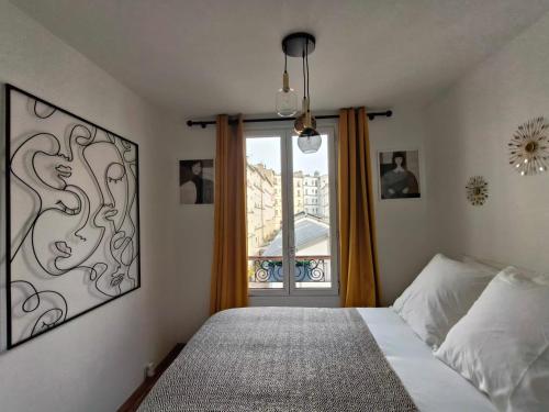 Postel nebo postele na pokoji v ubytování 30m2 in the heart of Paris