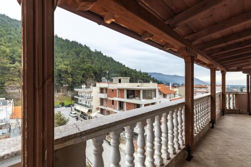 a balcony with a view of a city at HOME WITH VIEW in Xanthi