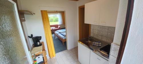 Kuchyň nebo kuchyňský kout v ubytování Ferienwohnung "Kleine Deichperle"