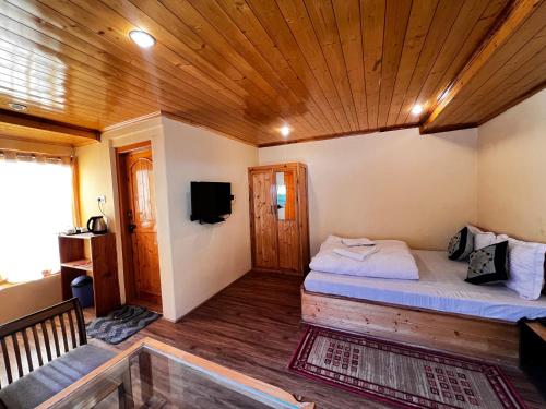 Postel nebo postele na pokoji v ubytování Ashina Eco Resort
