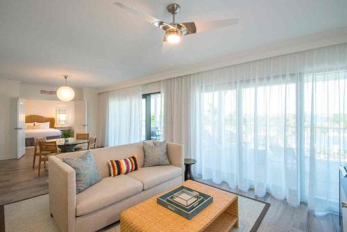 a living room with a couch and a table at Hawks Cay Resort in Marathon