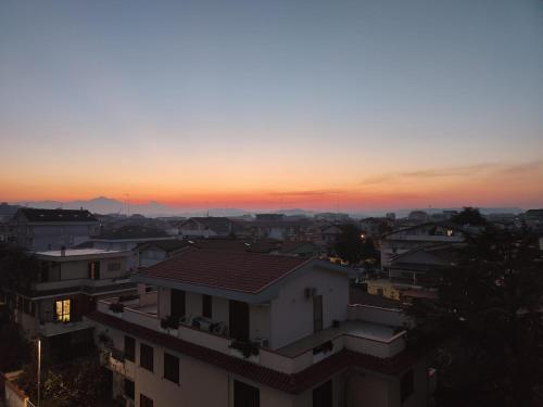 a view of a city at sunset at Sapore di Mare in Montesilvano