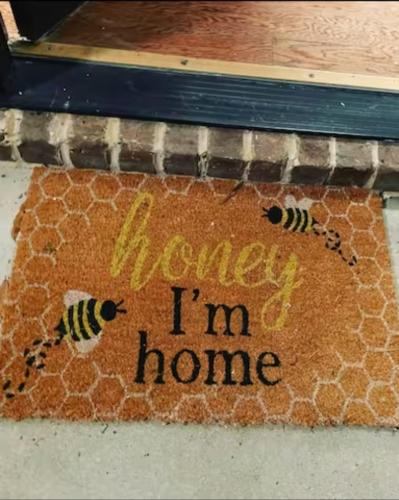 a sign that says honey im home with bees on it at Honey, I’m Home near Savannah - Seen on HGTV in Savannah