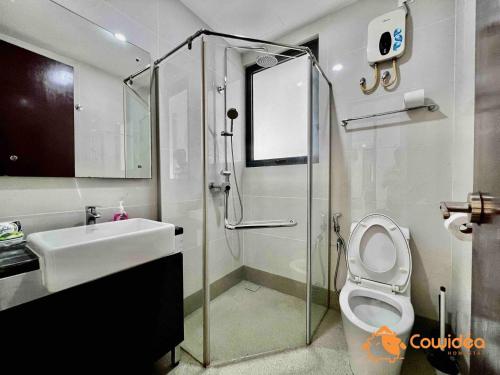 a bathroom with a shower and a toilet and a sink at DangaBay in CountryGarden - Fantastic2 #Cowidea in Johor Bahru