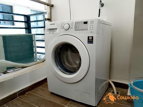 a washing machine in a room with a window at DangaBay in CountryGarden - Fantastic2 #Cowidea in Johor Bahru