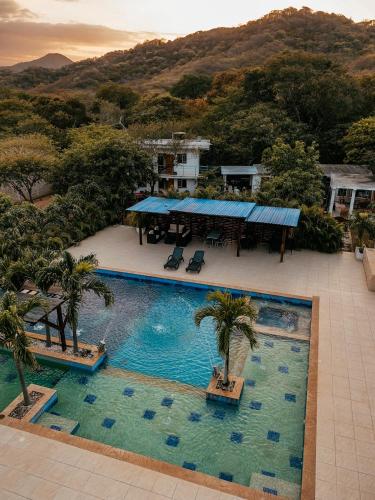 an aerial view of a swimming pool at a resort at Rancho Ton Hotel Boutique in Santa Marta