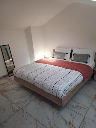 Postel nebo postele na pokoji v ubytování LAKE HOUSE CANZO