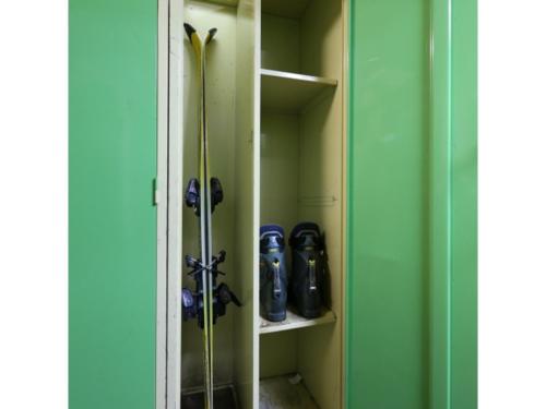 a walk in closet with blue and green walls at Hotel Mount Shiga - Vacation STAY 95300v in Yamanouchi