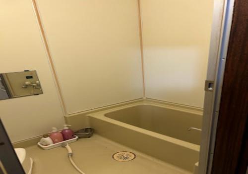 a bathroom with a bath tub and a sink at M,AP - Vacation STAY 16056 in Otaru