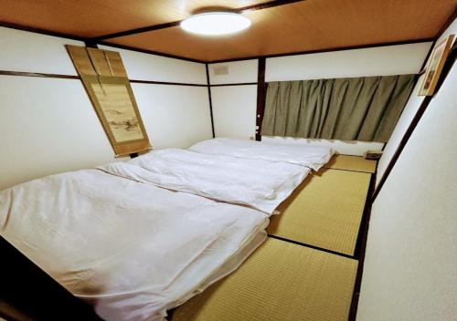 Tempat tidur dalam kamar di M,AP - Vacation STAY 16062