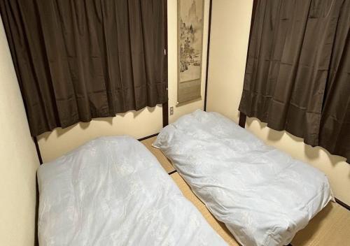 Tempat tidur dalam kamar di M,AP - Vacation STAY 16062
