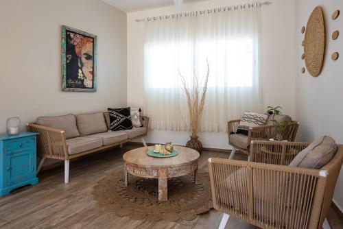 Posezení v ubytování TAKUMA BOUTIK HOTEL