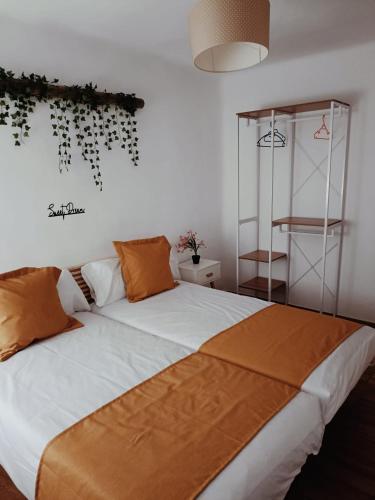 Postel nebo postele na pokoji v ubytování Casa Cobo Exclusivo Alojamiento en Madrid