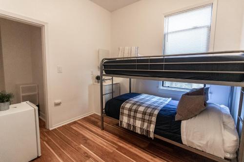 a bedroom with a bunk bed in a room at 1080 Folsom Residences in San Francisco