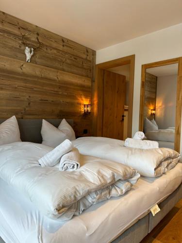 Voodi või voodid majutusasutuse Alpin- Chalet Gaisberg toas