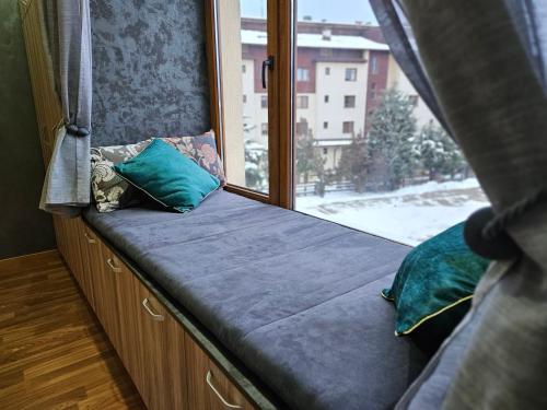 Postel nebo postele na pokoji v ubytování Стаята на Ив