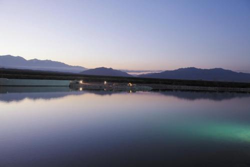 a view of a body of water at sunset at Rosell Boher Winery Lodge & Spa in Agrelo