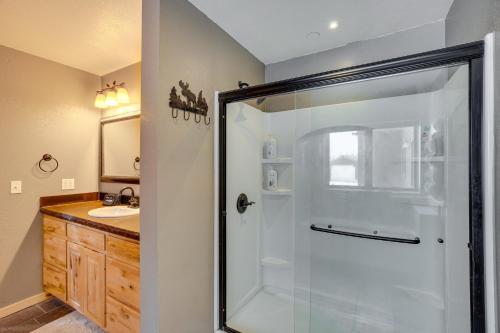 a bathroom with a shower and a sink at Spacious Gunnison Home Ski, Hike, Bike and Fish! in Gunnison
