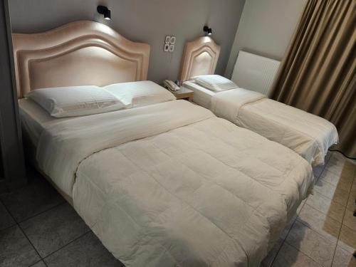 Un ou plusieurs lits dans un hébergement de l'établissement Hotel Anastasia