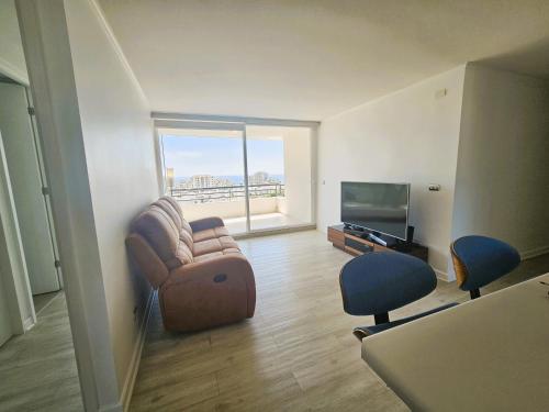 Μια τηλεόραση ή/και κέντρο ψυχαγωγίας στο Oceana Suites Papudo