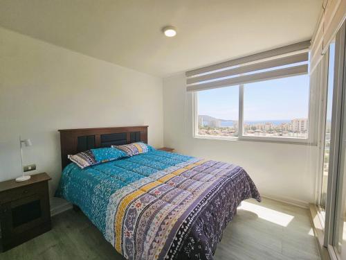 Ένα ή περισσότερα κρεβάτια σε δωμάτιο στο Oceana Suites Papudo