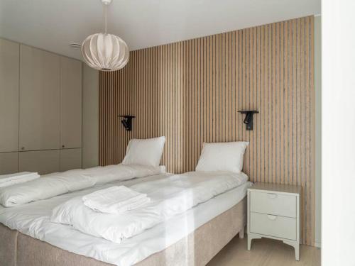 Кровать или кровати в номере Are Alpine Retreat 6-Guest Ski Apt with Sauna