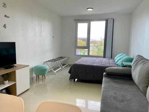 En eller flere senge i et værelse på Ushuaia apartments