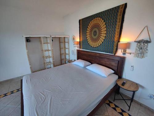 Tempat tidur dalam kamar di Cole Bay Retreat