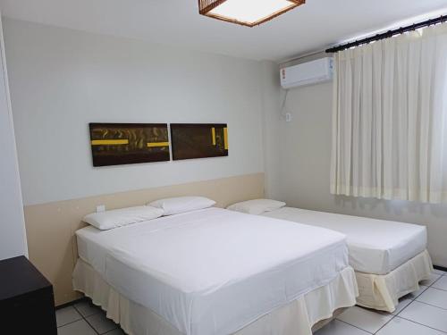 Postel nebo postele na pokoji v ubytování Gran lençóis Flat 2 suítes vista piscina