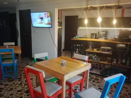 TV a/nebo společenská místnost v ubytování La iguana café y más