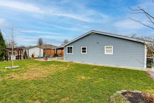 a gray house with a yard at Family-Friendly Home with Yard 27 Mi to Nashville! in Springfield
