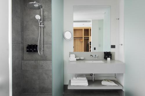 a bathroom with a sink and a mirror at Samphire Rottnest in Rottnest Island