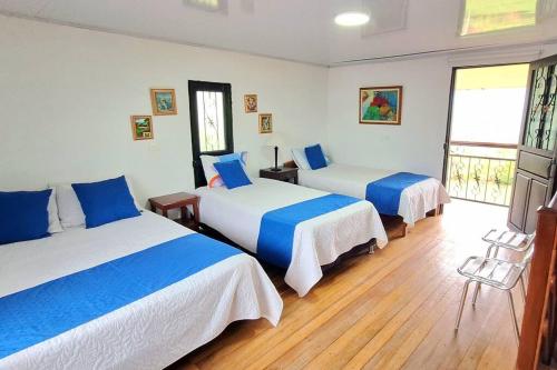 Een bed of bedden in een kamer bij SA Cabaña cómoda y acogedora