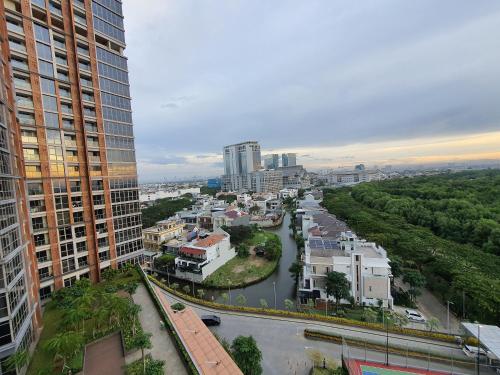 a view of a city with a river and buildings at 2BedRooms Apartment in Gold Coast PIK in Jakarta