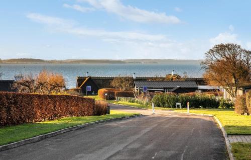 an empty road next to a body of water at 2 Bedroom Stunning Home In Vordingborg in Vordingborg